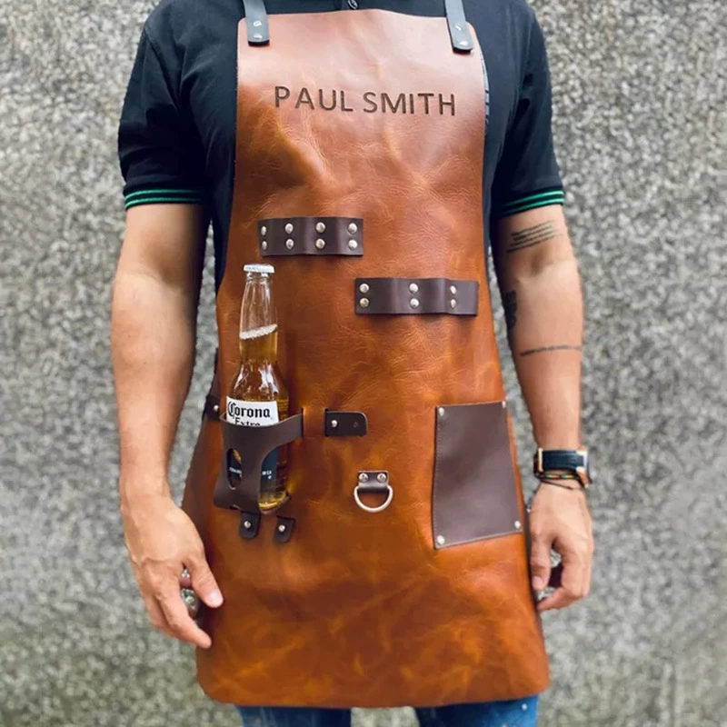 Leatherwork Apron - ผ้ากันเปื้อนครัวผ้ากันเปื้อนบาร์บีคิวกลางแจ้งหนัง PU มัลติฟังก์ชั่นทนน้ํามันผ้ากันเปื้อนทํางานผลิตภัณฑ์บ้านและห้องครัว
